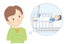 入院した男性を心配する女性