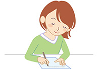 書いている女性