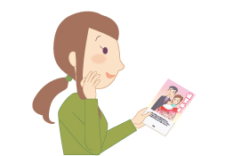 年賀状を持った女性